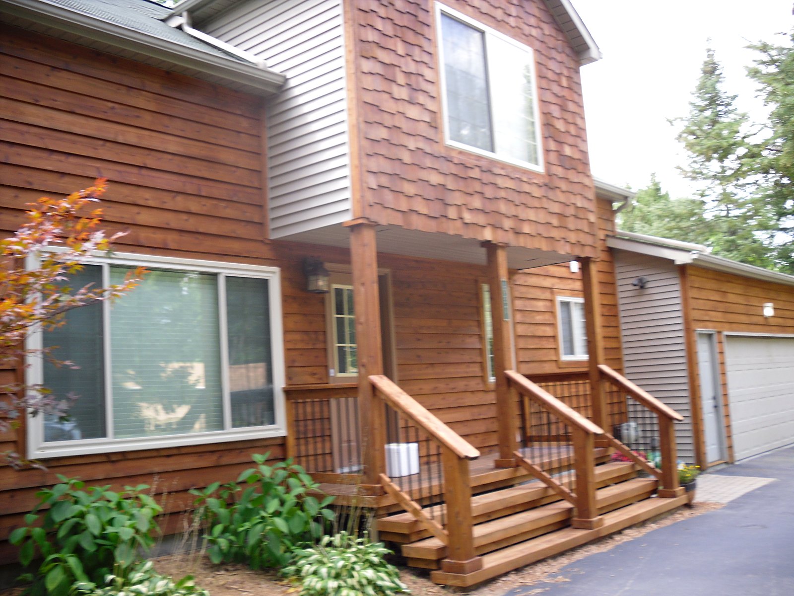 Home exterior with new deck in Clarkston, MI