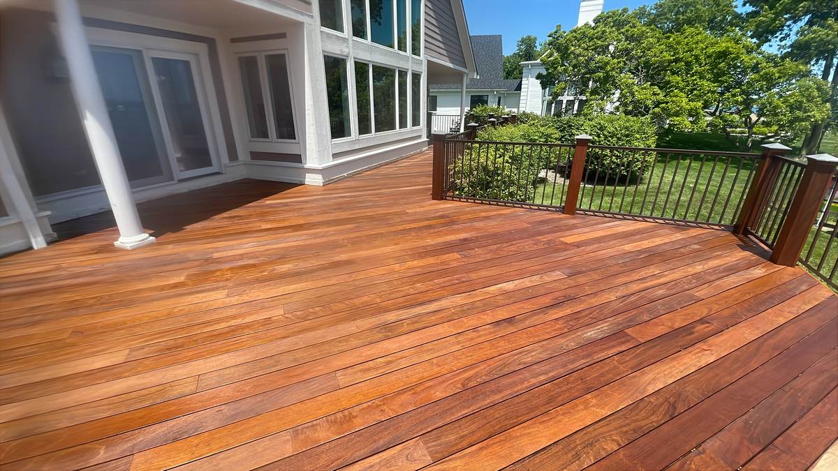 Freshly stained wood deck with railing in Clinton, MI