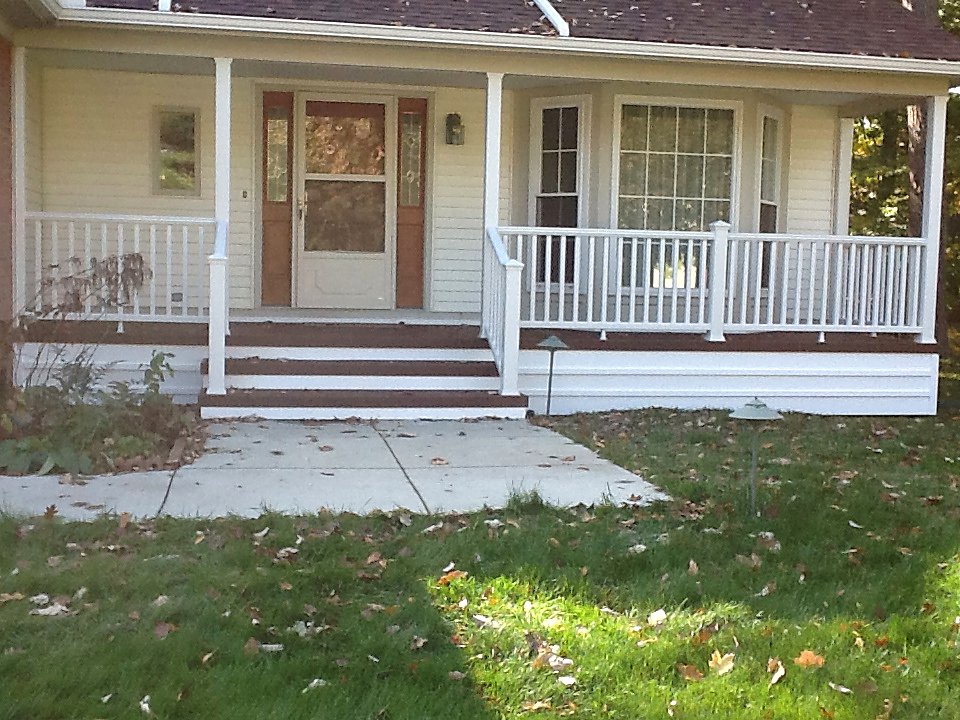 Freshly restored front porch in Hartland, MI