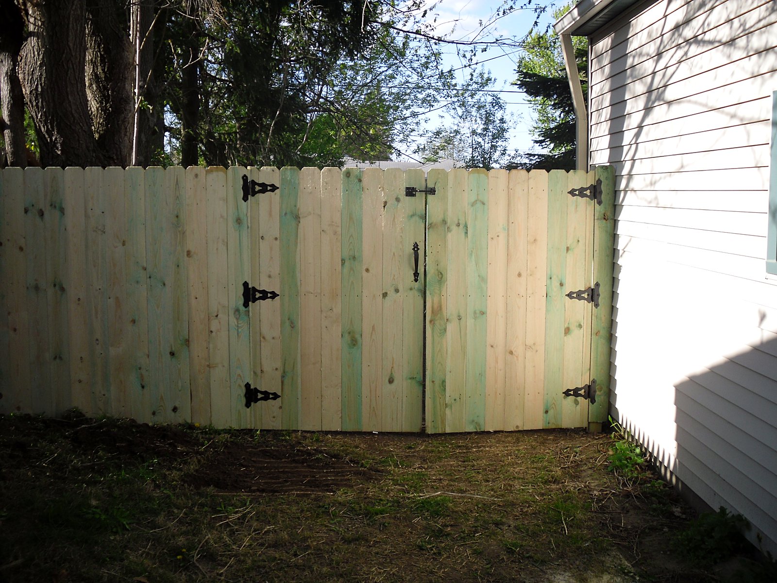 Rehabbed fence with new gate, not yet stained in Troy, MI