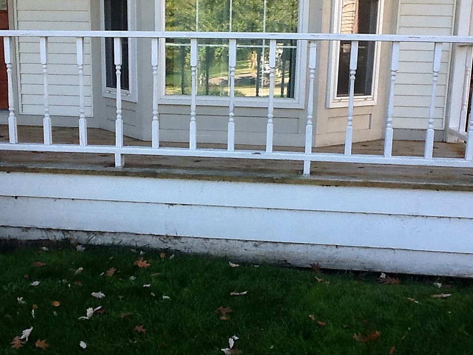 Porch steps before restoration in Hartland, MI
