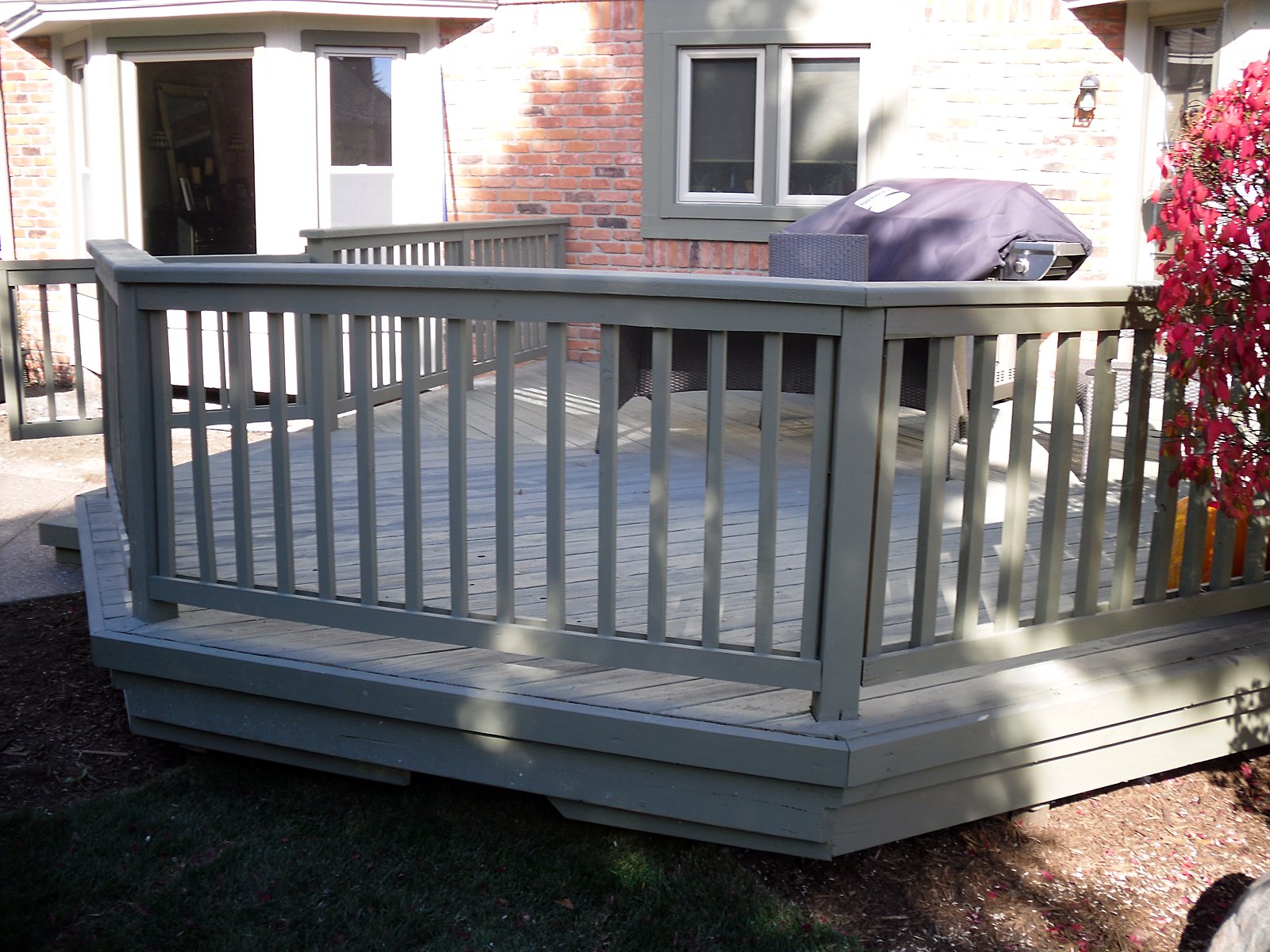 Freshly painted deck and railing, wide view in Canton, MI