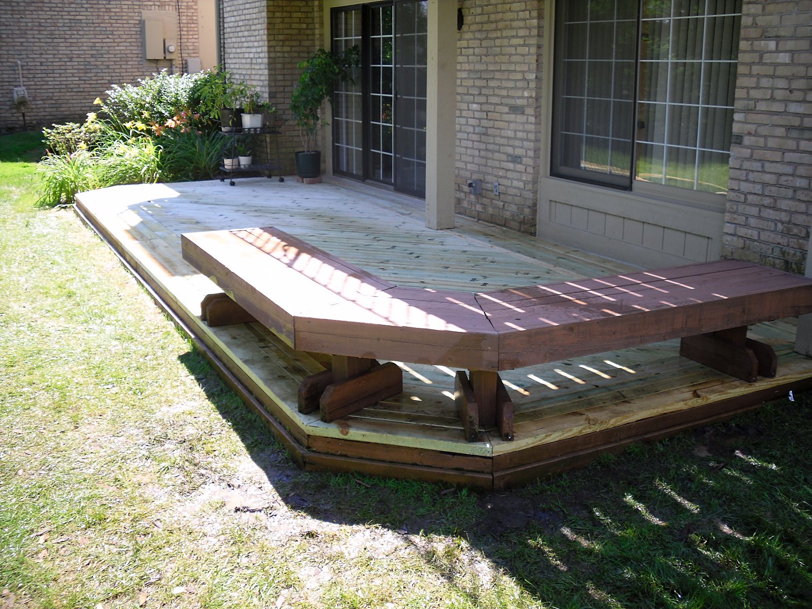 New pressure-treated deck with built-in bench in Southeast Michigan