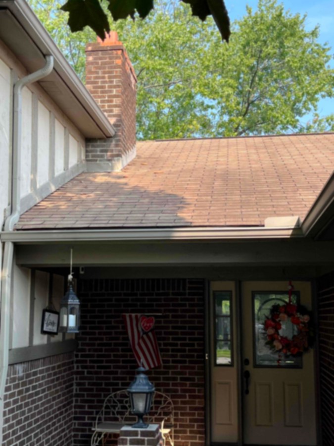 Same roof after soft washing, streaking gone in Southeast Michigan